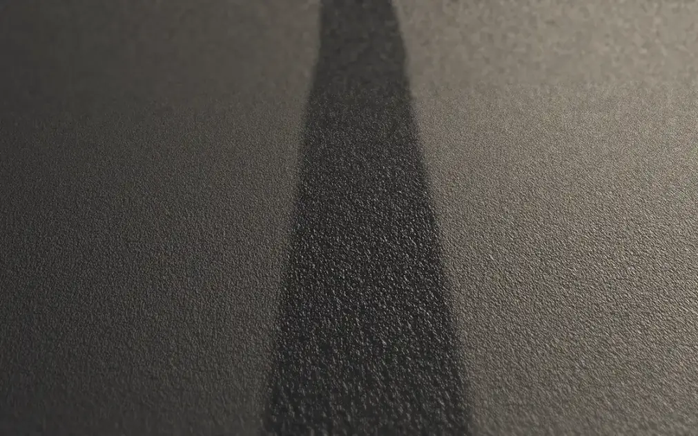 One dark, damp extraction lane running through dry carpet
